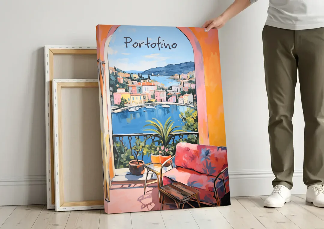 Terrace Painting Over Portofino Harbor canvas wall art leaning against a wall next to blank canvases