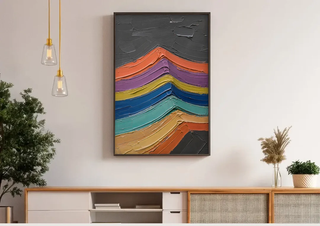 Textured Abstract Buckled Rainbow Strata canvas wall art above a wooden sideboard under pendant lights