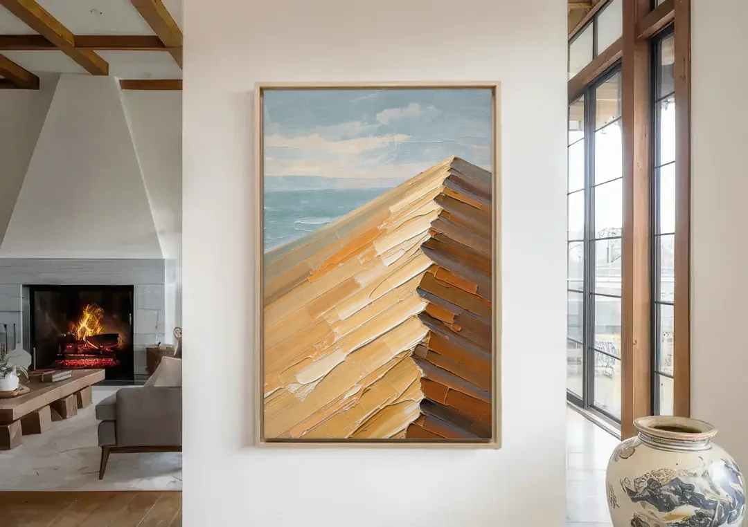 Textured Beige Abstract Dune Crest canvas wall art in a living room with a fireplace