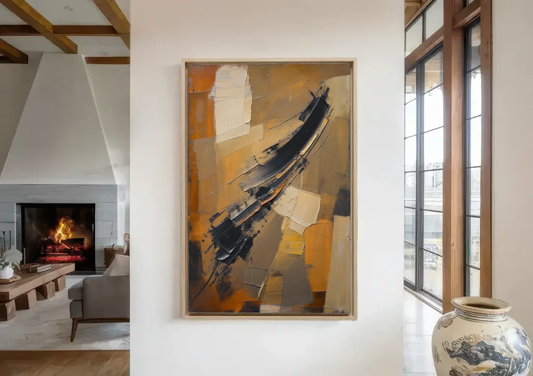 Textured Black Knife Sweep Over Ochre canvas wall art in a living room with a fireplace