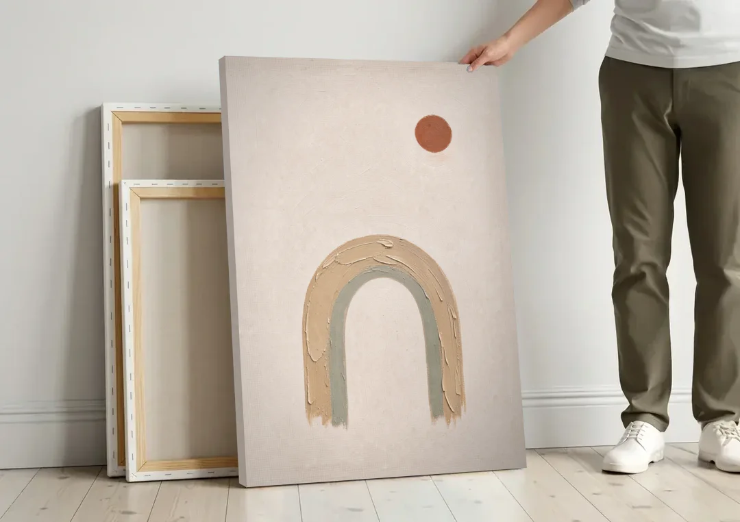 Textured Boho Wall Art with Arch and Rust Sun canvas wall art leaning against a wall next to blank canvases