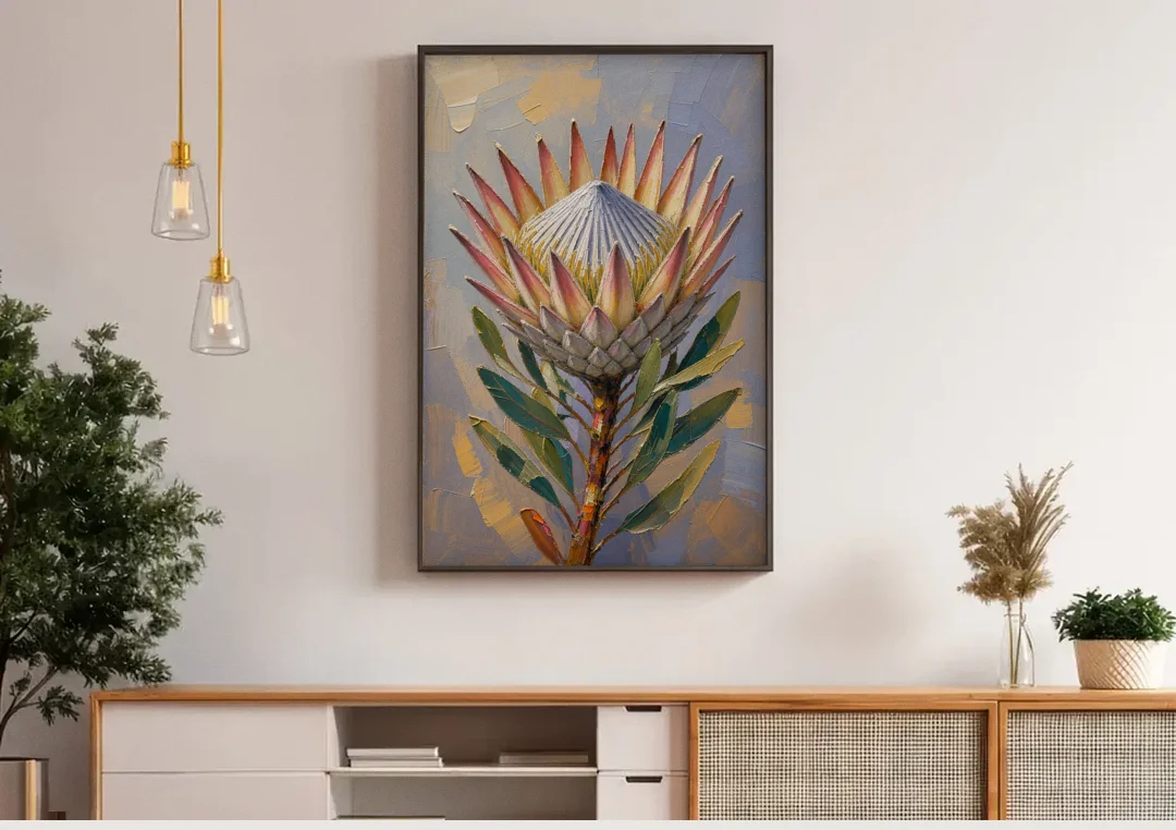 Textured Floral Wall Art of a King Protea canvas wall art above a wooden sideboard under pendant lights