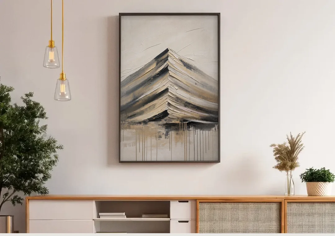 Textured Mountain Painting with Dripping Base canvas wall art above a wooden sideboard under pendant lights