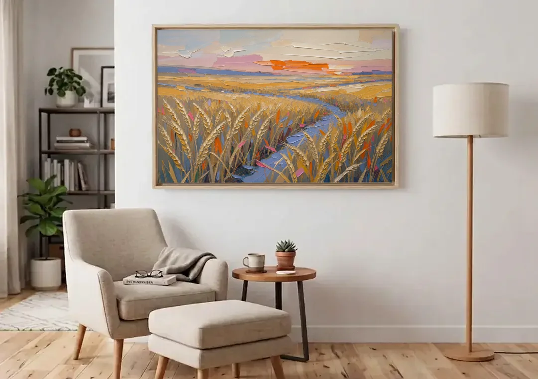 Textured Ripened Grain at Dusk canvas wall art above an armchair in a bright living room
