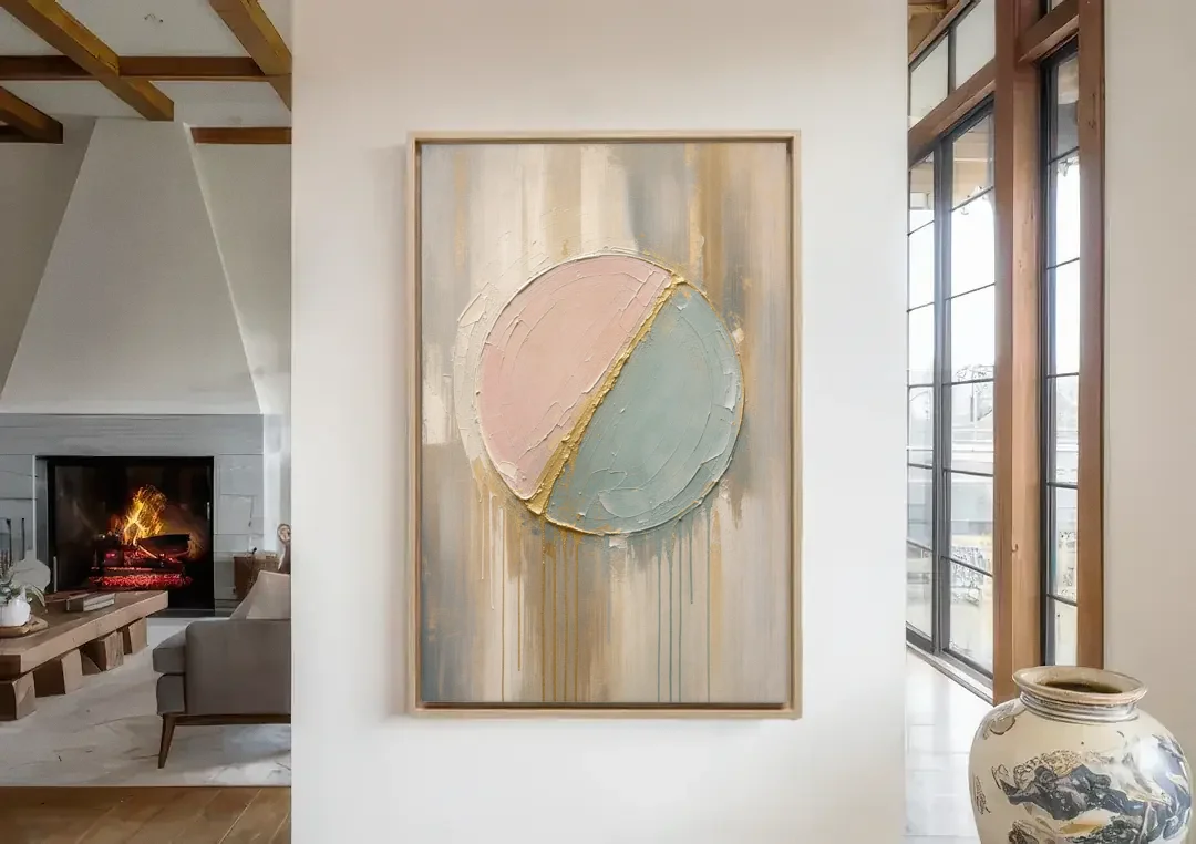 Textured Wall Art with Blush and Sea Glass Halves canvas wall art in a living room with a fireplace