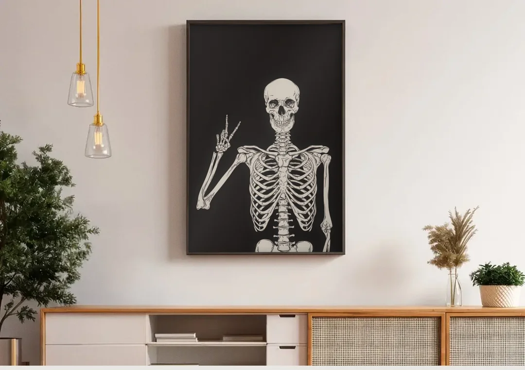 The Cool Halloween Skeleton canvas wall art above a wooden sideboard under pendant lights