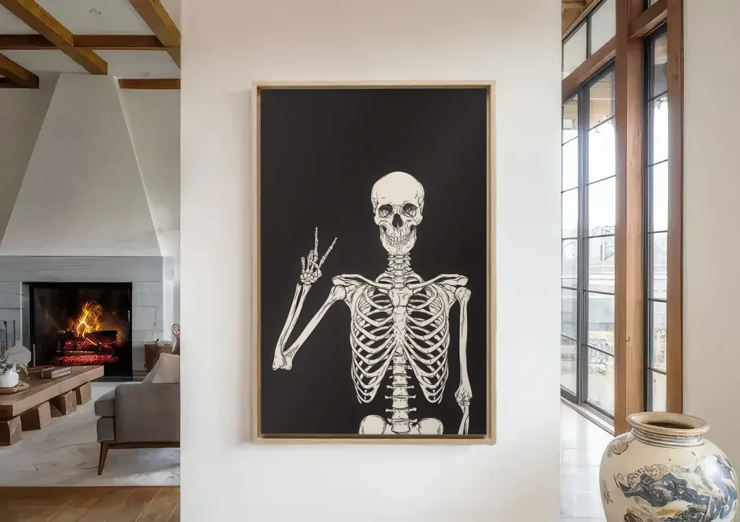 The Cool Halloween Skeleton canvas wall art in a living room with a fireplace
