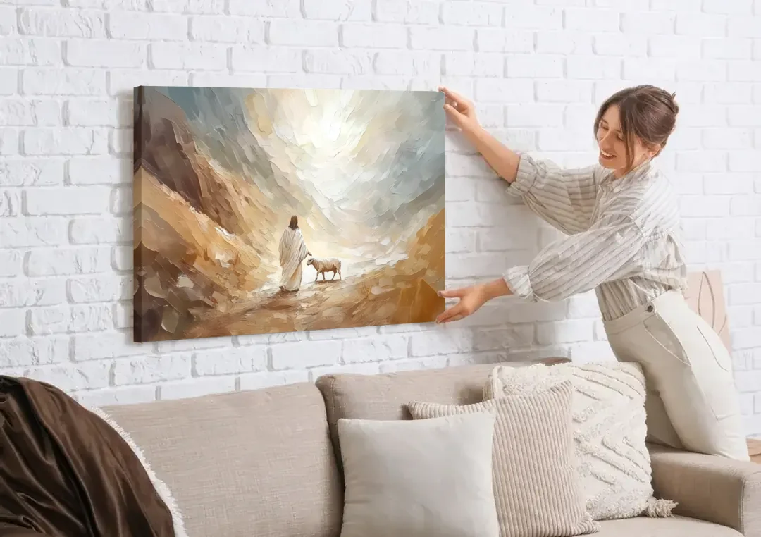 The Good Shepherd Abstract Christian canvas wall art being hung on a white brick wall above a sofa
