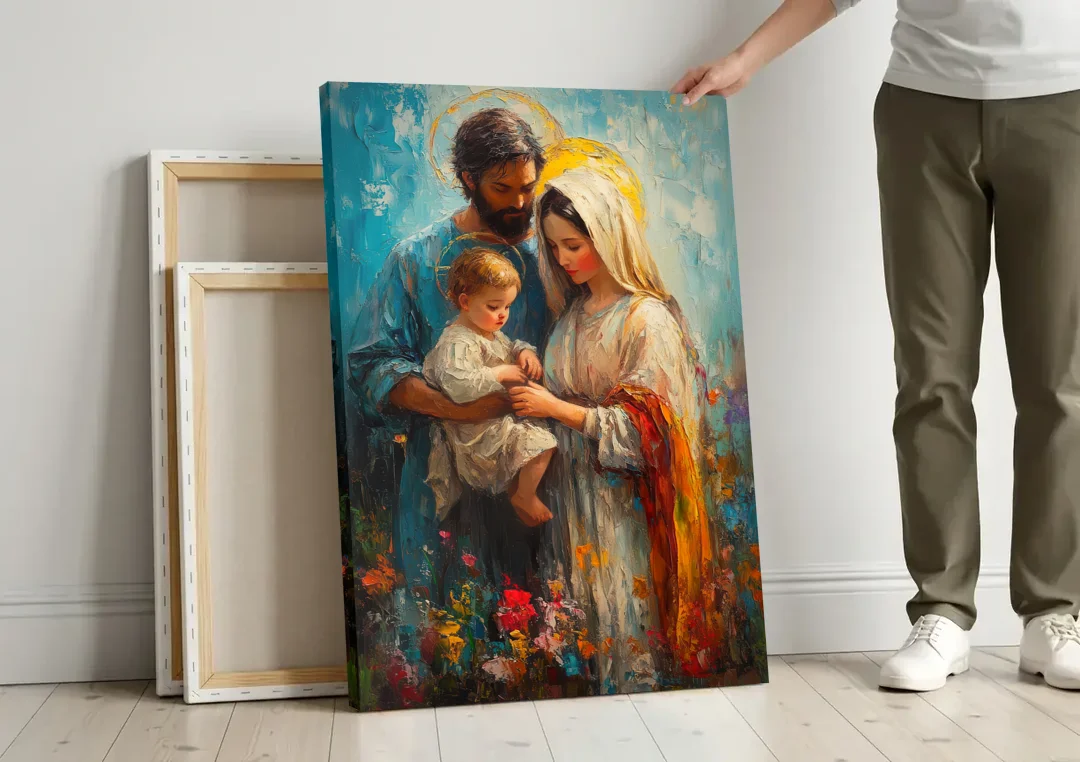 The Holy Family Christian Abstract canvas wall art leaning against a wall next to blank canvases