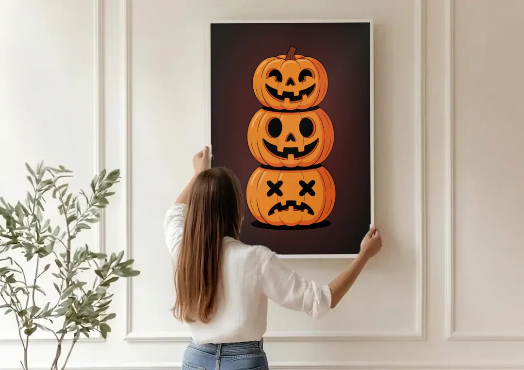 The Three Pumpkins canvas wall art being hung on a paneled wall