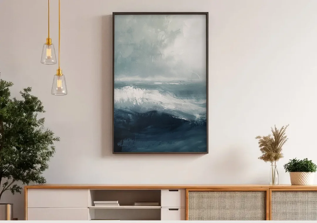 The Wave Breathes canvas wall art above a wooden sideboard under pendant lights