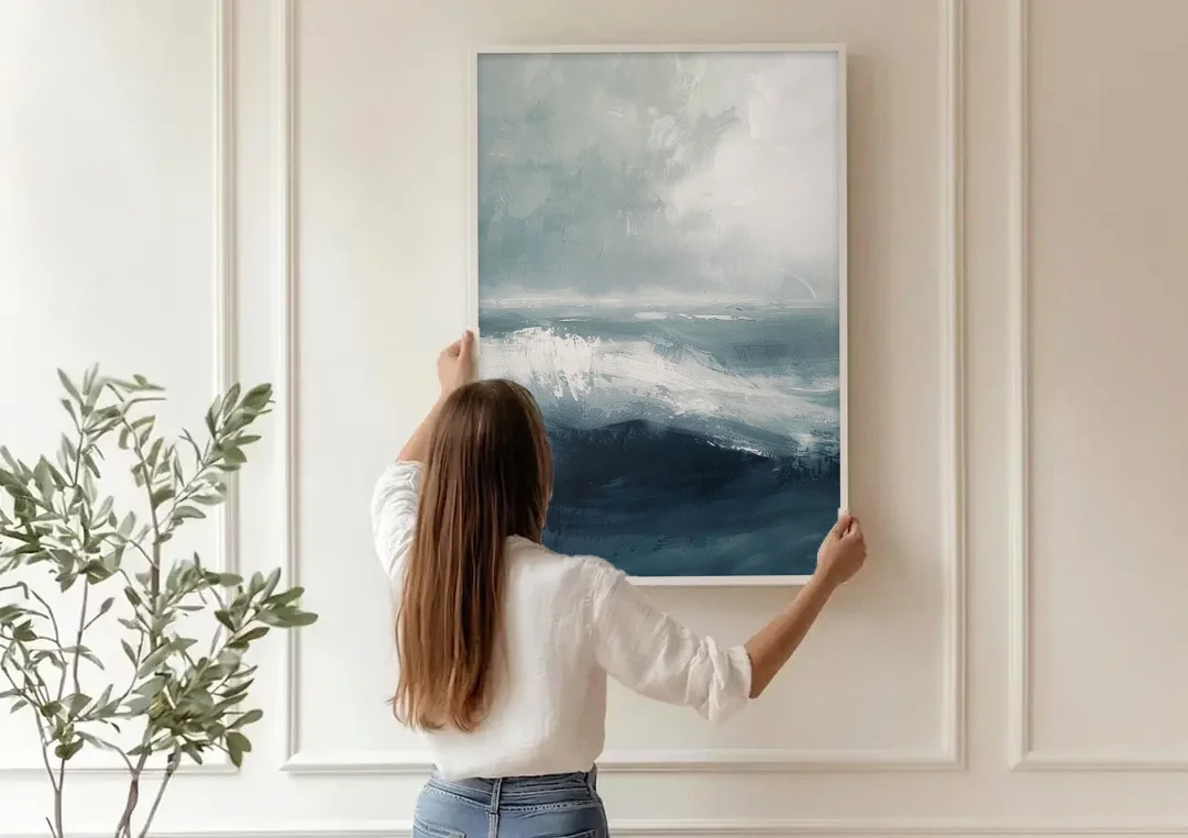 The Wave Breathes canvas wall art being hung on a paneled wall