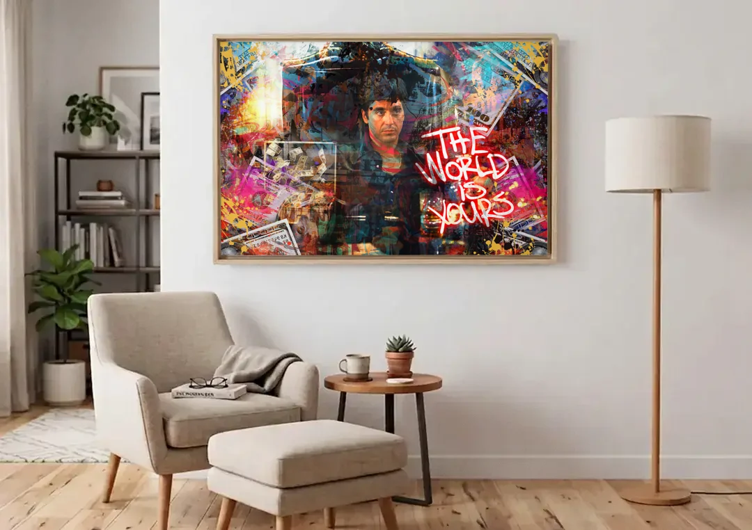 The World is Yours canvas wall art above an armchair in a bright living room