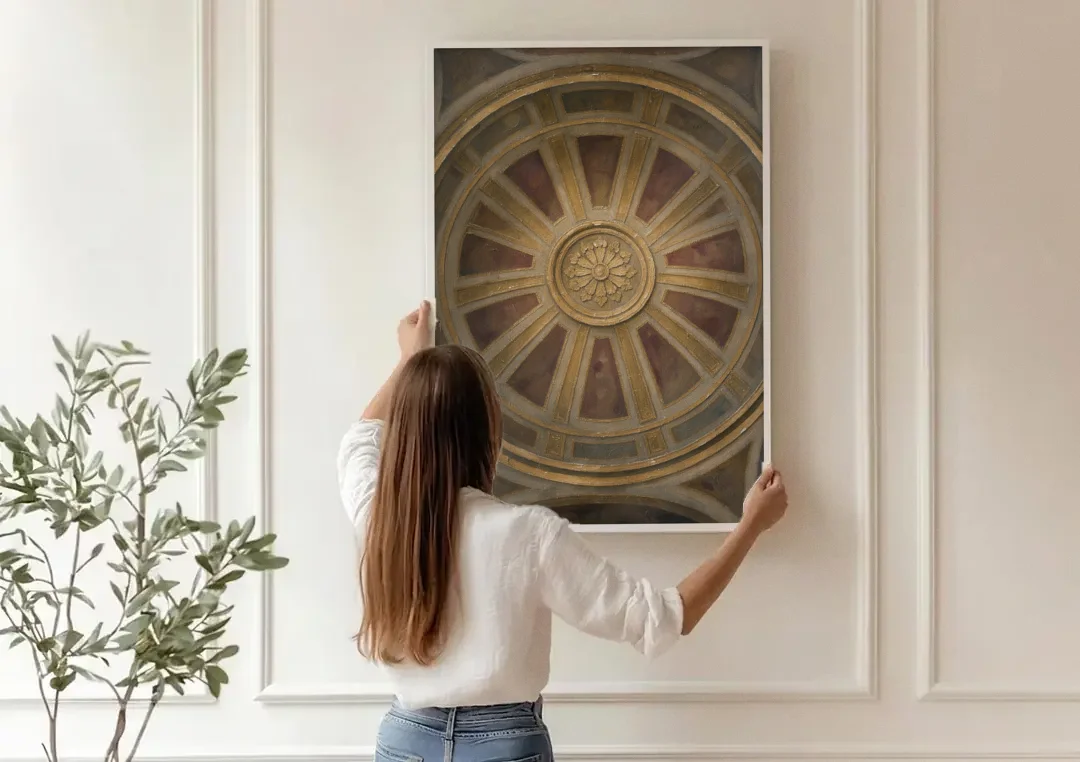 Theater Room Wall Decor with Gilded Dome Rosette canvas wall art being hung on a paneled wall