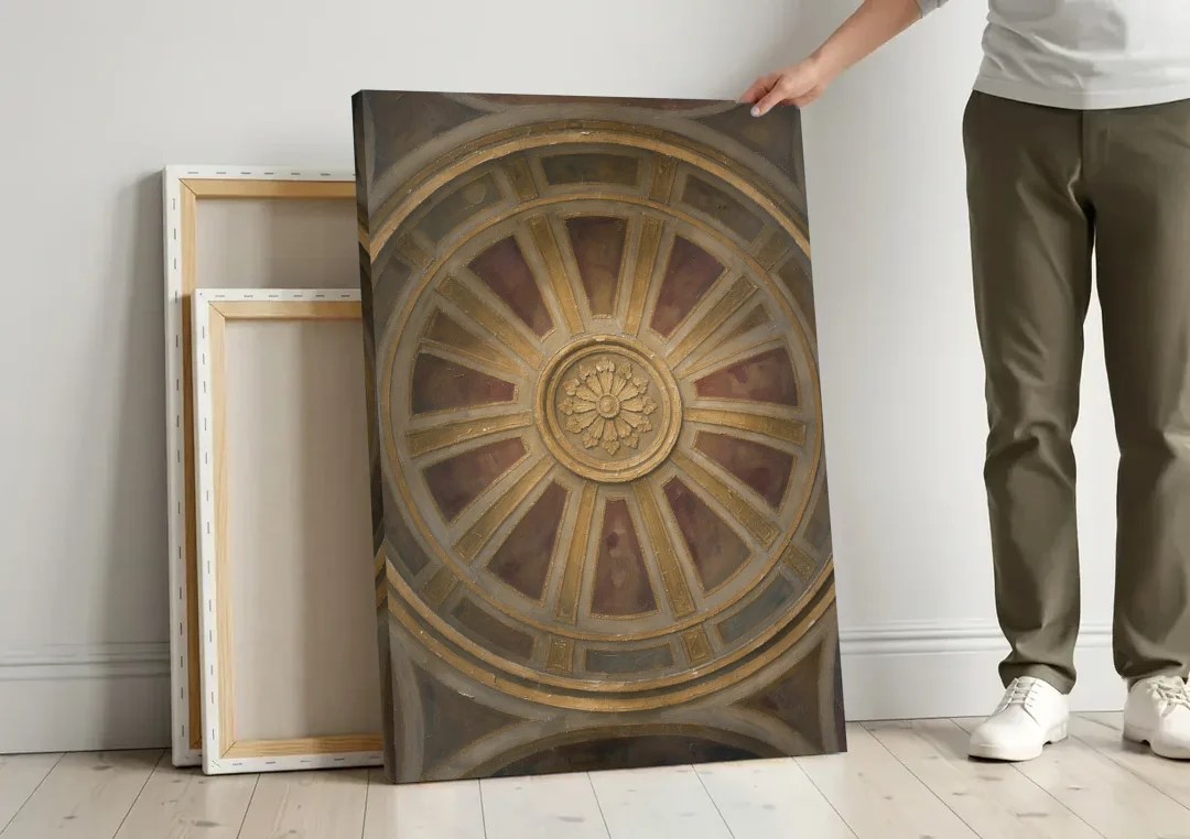 Theater Room Wall Decor with Gilded Dome Rosette canvas wall art leaning against a wall next to blank canvases