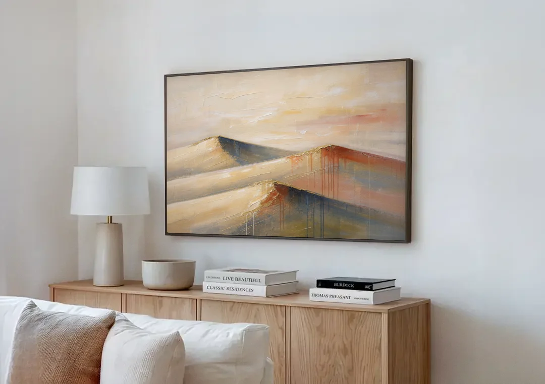 Three Abstract Terracotta Dune Crests canvas wall art above a wooden sideboard next to a sofa