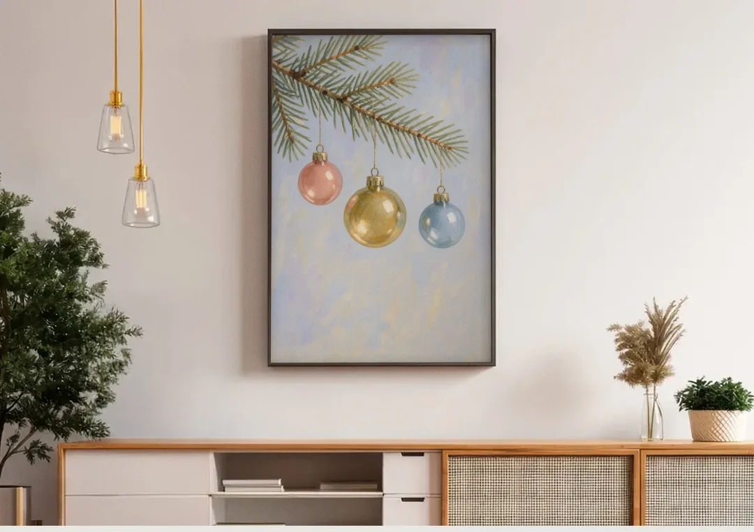 Three Glass Baubles on a Fir Branch canvas wall art above a wooden sideboard under pendant lights