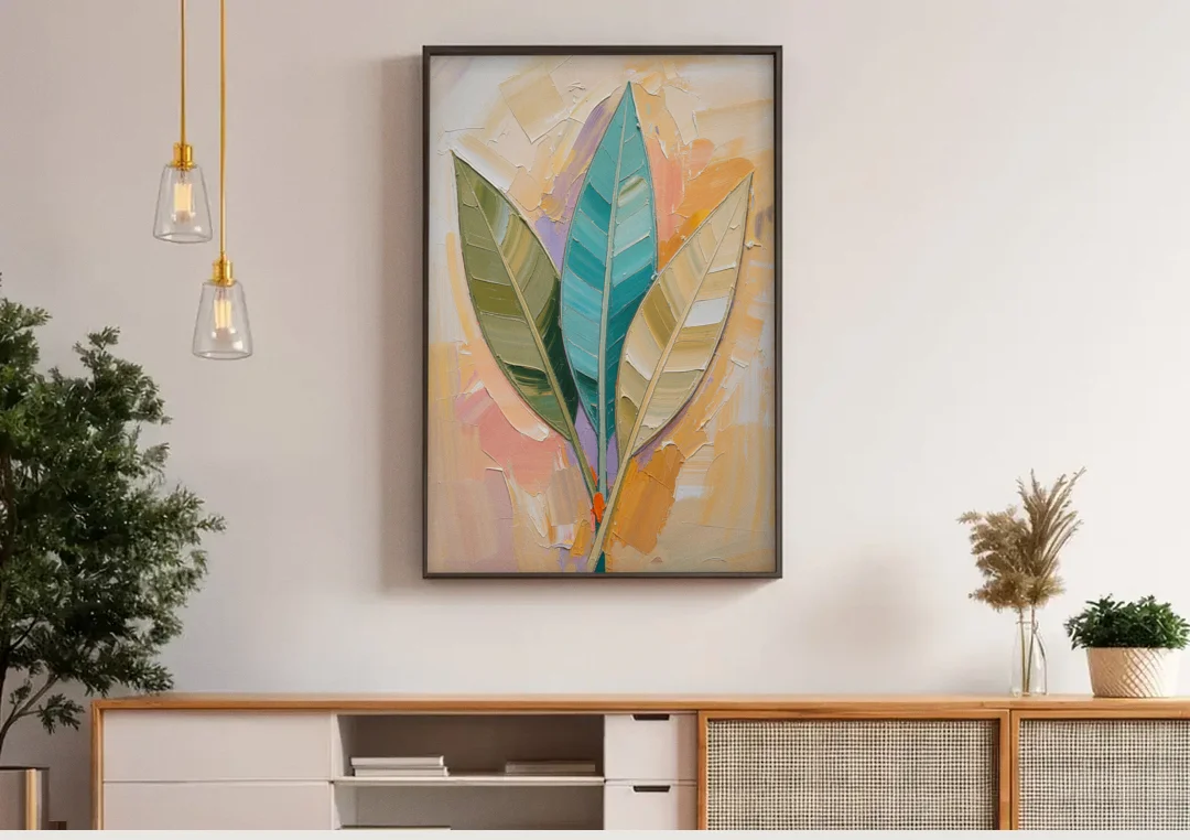 Three Neutral Textured Leaves in Sage and Teal canvas wall art above a wooden sideboard under pendant lights