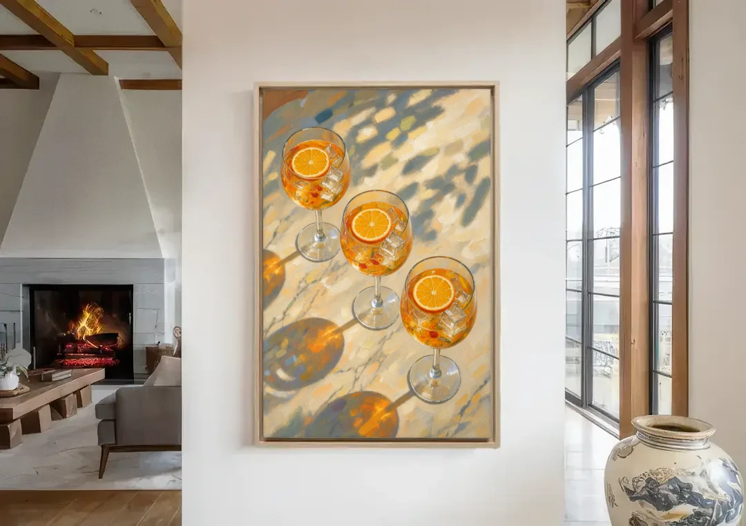Three Orange Spritz Glasses in Dappled Sunlight canvas wall art in a living room with a fireplace