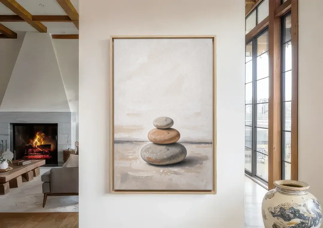 Three Stacked Stones on Pale Dusk Ground canvas wall art in a living room with a fireplace