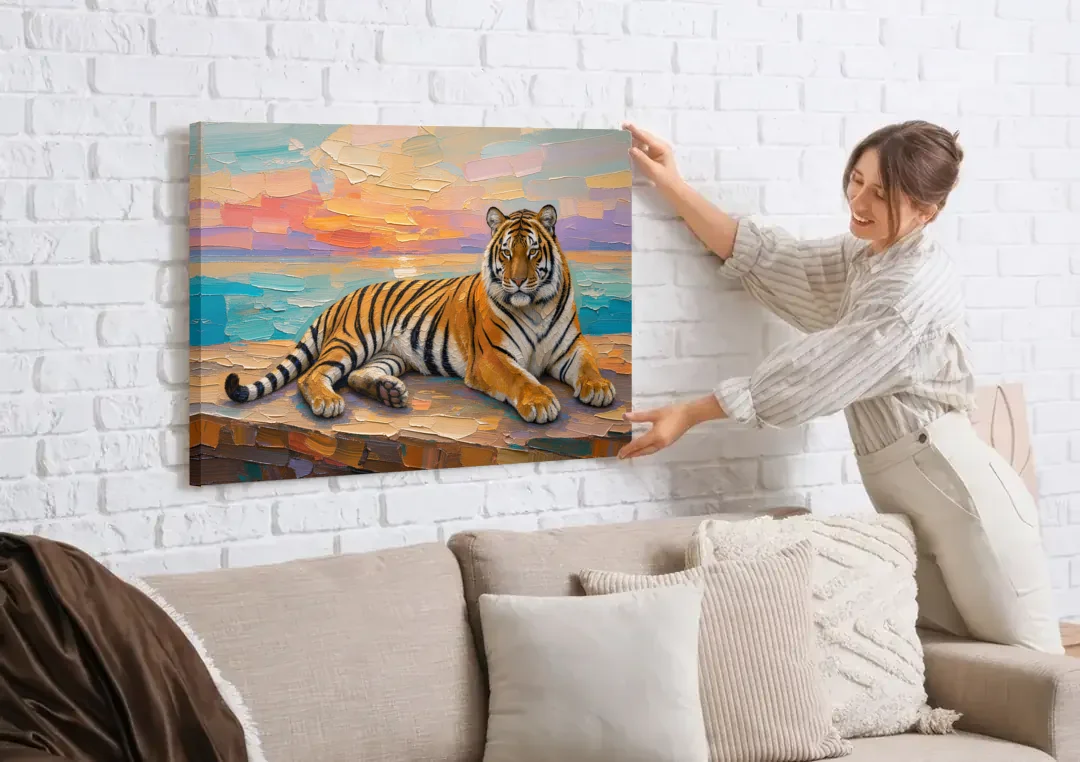 Tiger Art Print on the Sunset Ledge canvas wall art being hung on a white brick wall above a sofa