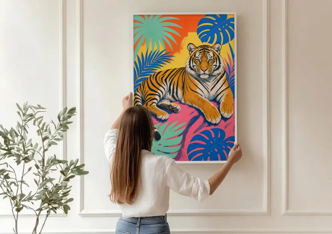 Tiger Lounging Among Monstera and Palms canvas wall art being hung on a paneled wall