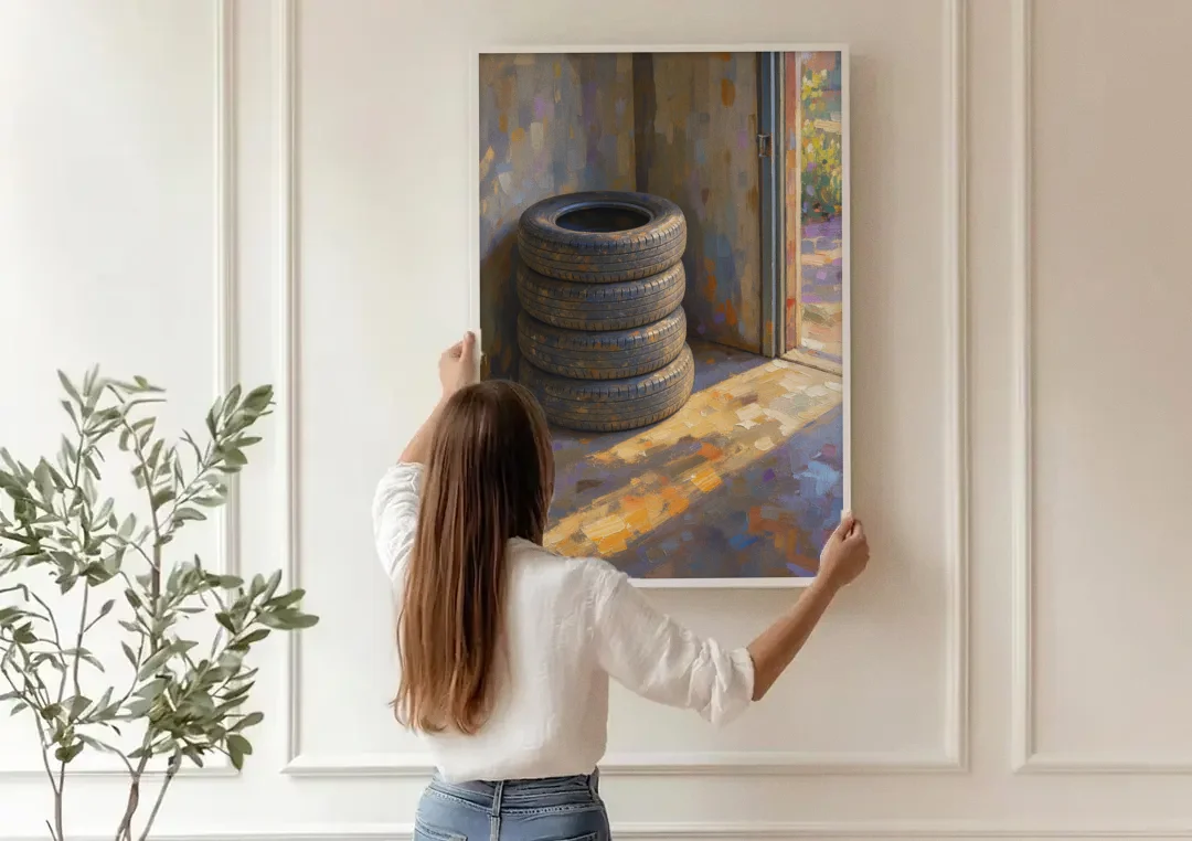 Tire Wall Art of Four Tires in Morning Light canvas wall art being hung on a paneled wall