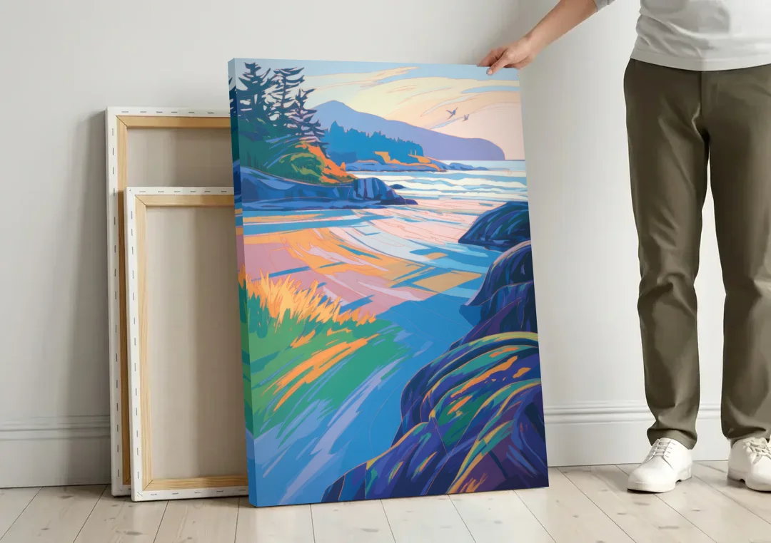 Tofino Coastline canvas wall art leaning against a wall next to blank canvases