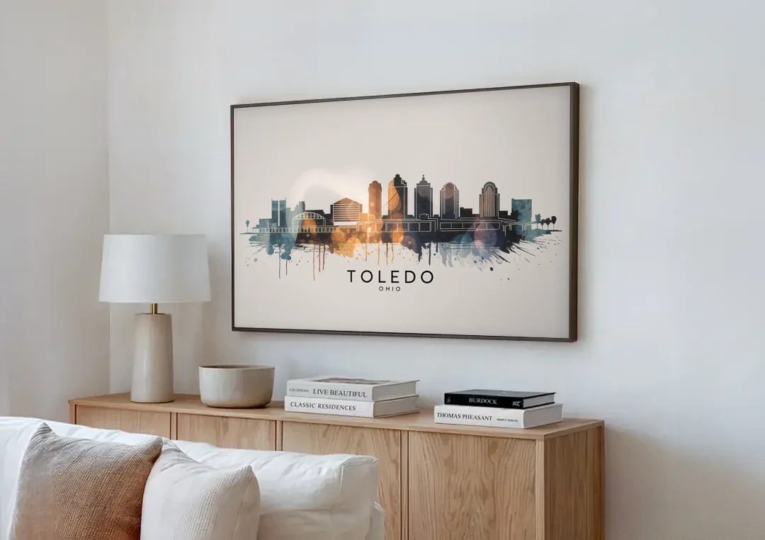 Toledo Skyline Panorama canvas wall art above a wooden sideboard next to a sofa