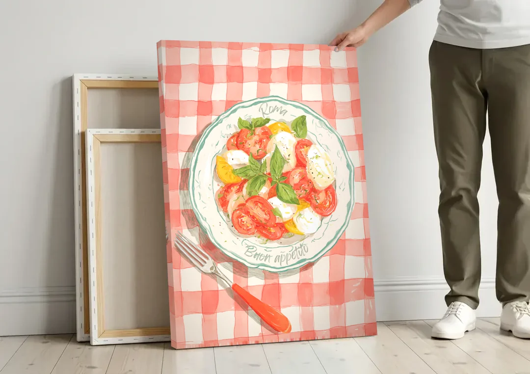 Tomato Painting of a Caprese Salad canvas wall art leaning against a wall next to blank canvases