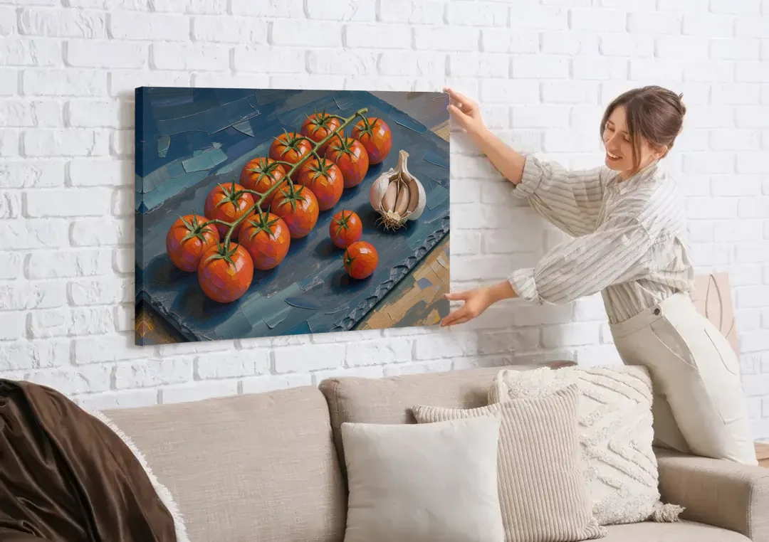 Tomato Painting on a Slate Board canvas wall art being hung on a white brick wall above a sofa