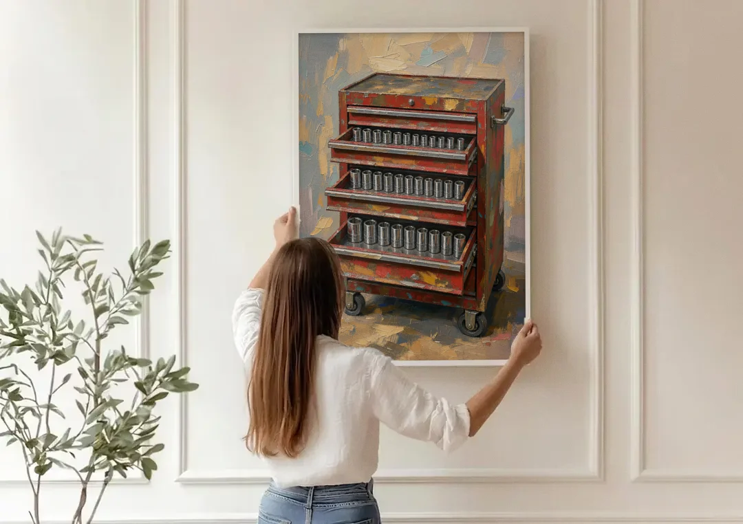 Toolbox Painting with Three Open Drawers canvas wall art being hung on a paneled wall