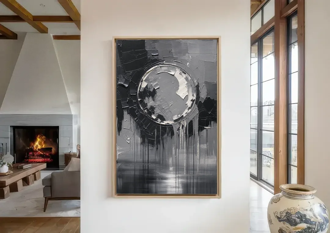 Torn Grey Circle Over Black Drips canvas wall art in a living room with a fireplace