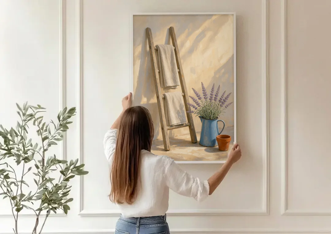 Towel Ladder with Lavender Pitcher canvas wall art being hung on a paneled wall