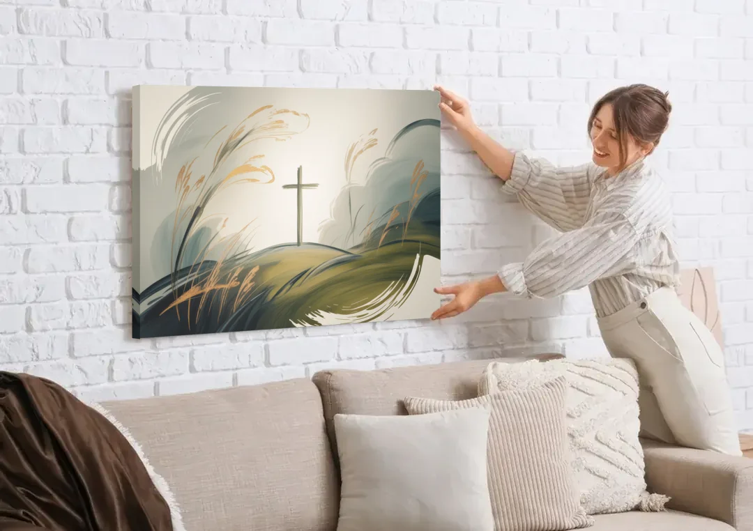 Tranquil Cross Minimalist Christian canvas wall art being hung on a white brick wall above a sofa