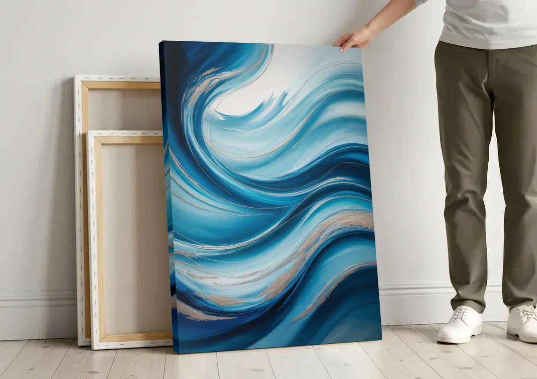 Tranquil Oceanic Movement Blue Abstract canvas wall art leaning against a wall next to blank canvases