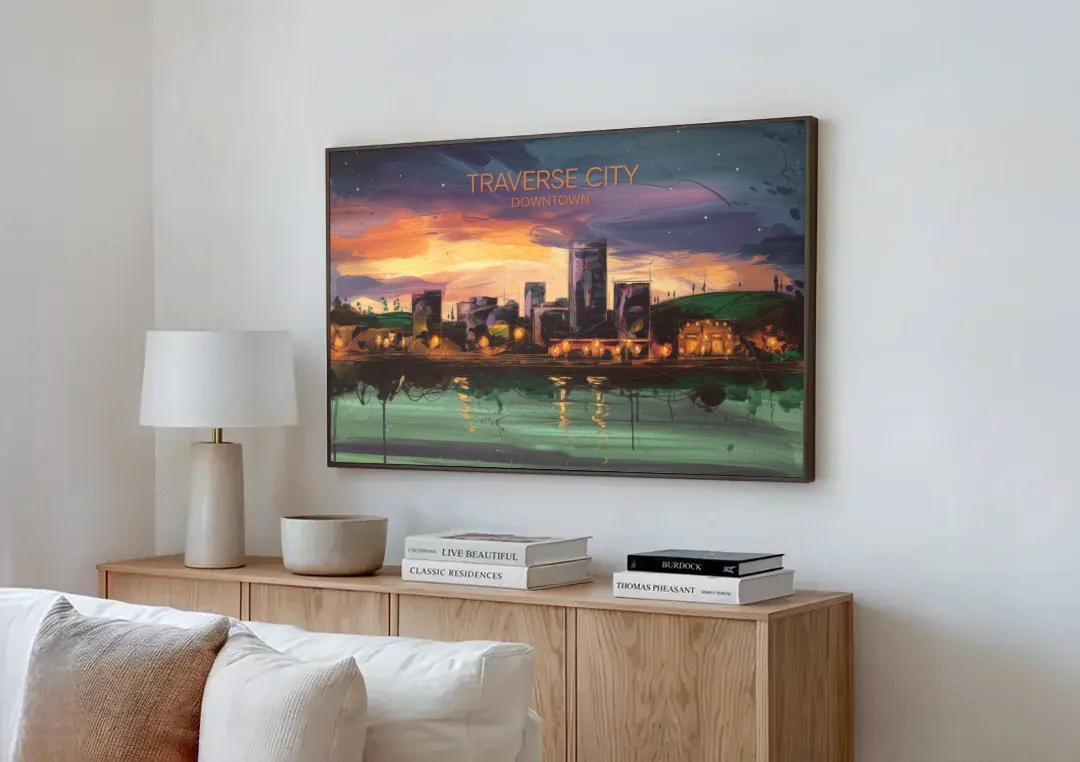 Traverse City Downtown Skyline canvas wall art above a wooden sideboard next to a sofa
