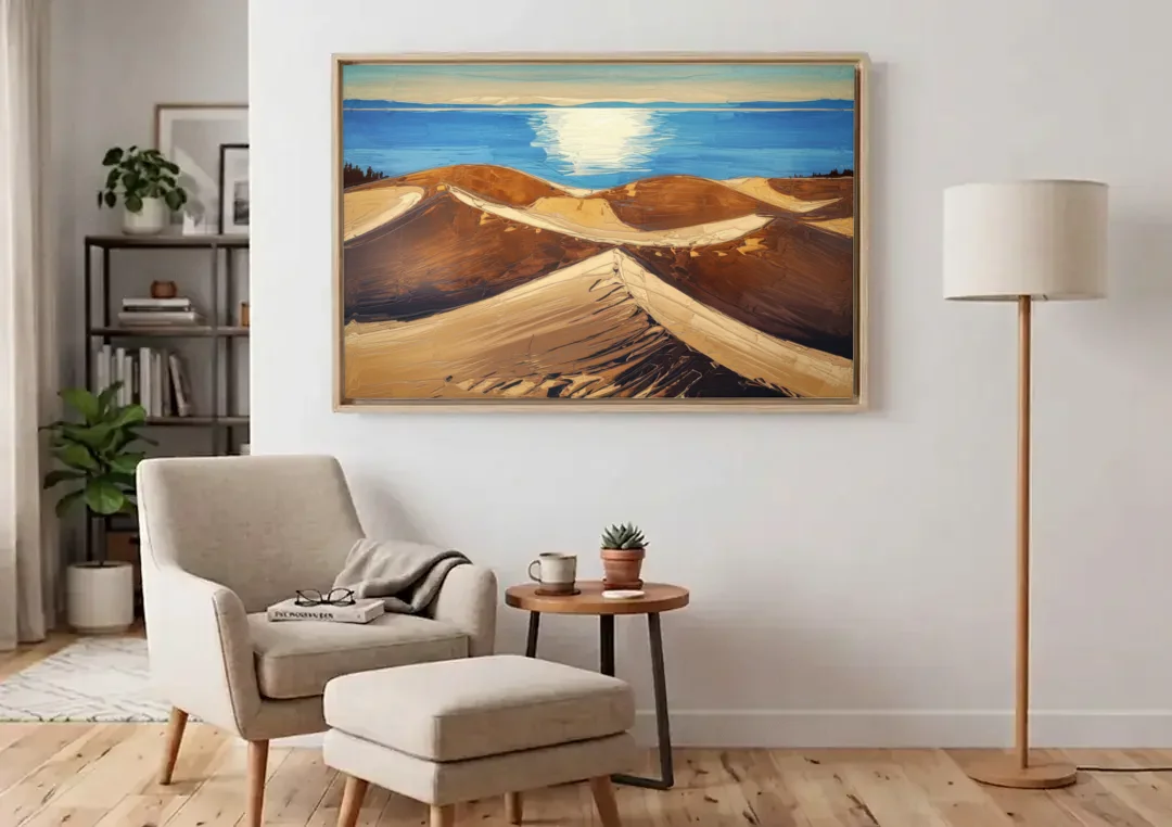 Traverse City Sleeping Bear Dunes canvas wall art above an armchair in a bright living room