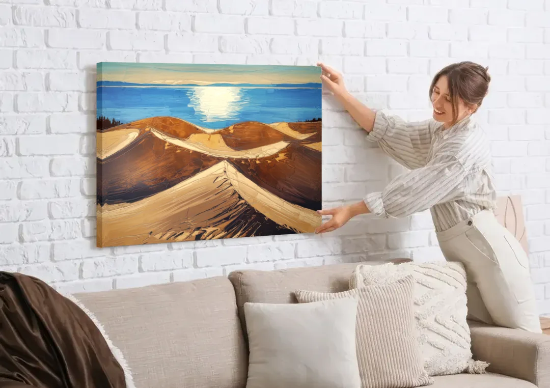 Traverse City Sleeping Bear Dunes canvas wall art being hung on a white brick wall above a sofa