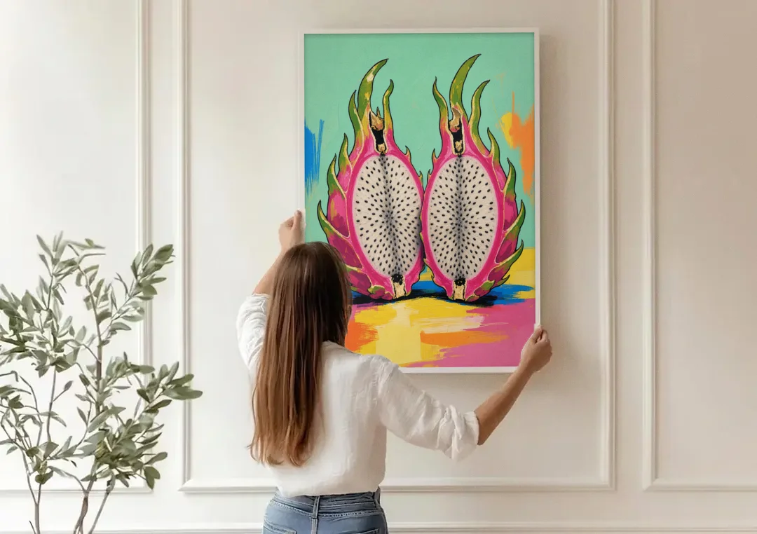 Tropical Kitchen Decor with Dragon Fruit Halves canvas wall art being hung on a paneled wall