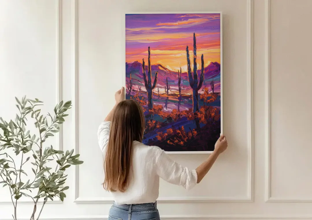 Tucson Saguaro Silhouettes canvas wall art being hung on a paneled wall