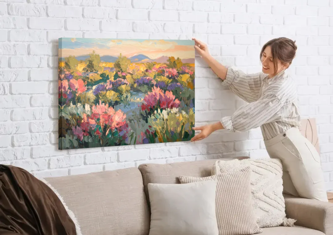 Tucson Wildflower Fields canvas wall art being hung on a white brick wall above a sofa