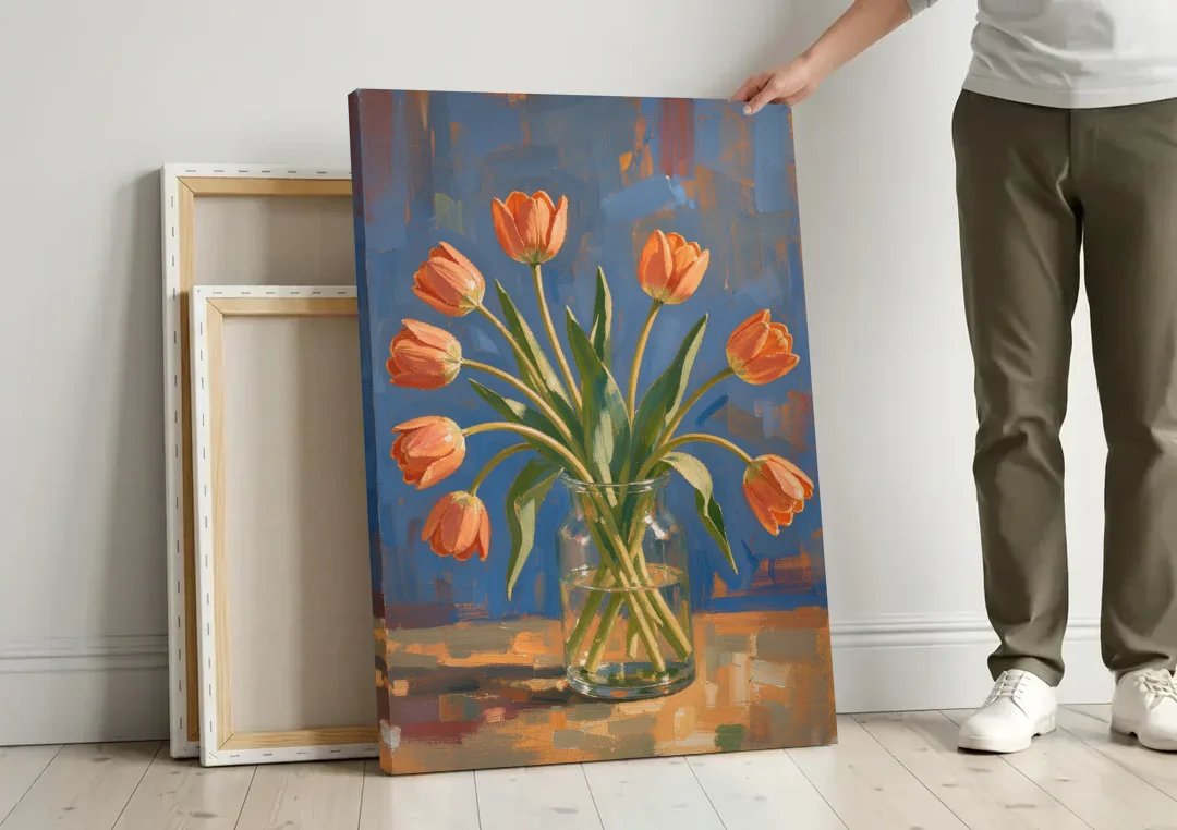 Tulip Painting Canvas in a Clear Glass Vase canvas wall art leaning against a wall next to blank canvases