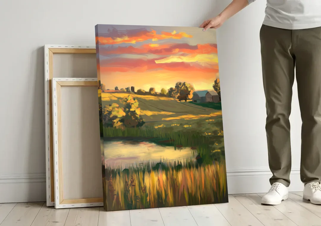Tulsa Golden Hour canvas wall art leaning against a wall next to blank canvases