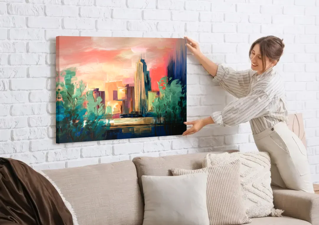 Tulsa Midtown Scenery canvas wall art being hung on a white brick wall above a sofa