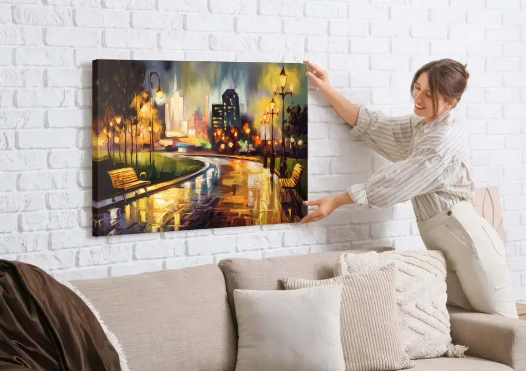 Tulsa Night Lights canvas wall art being hung on a white brick wall above a sofa