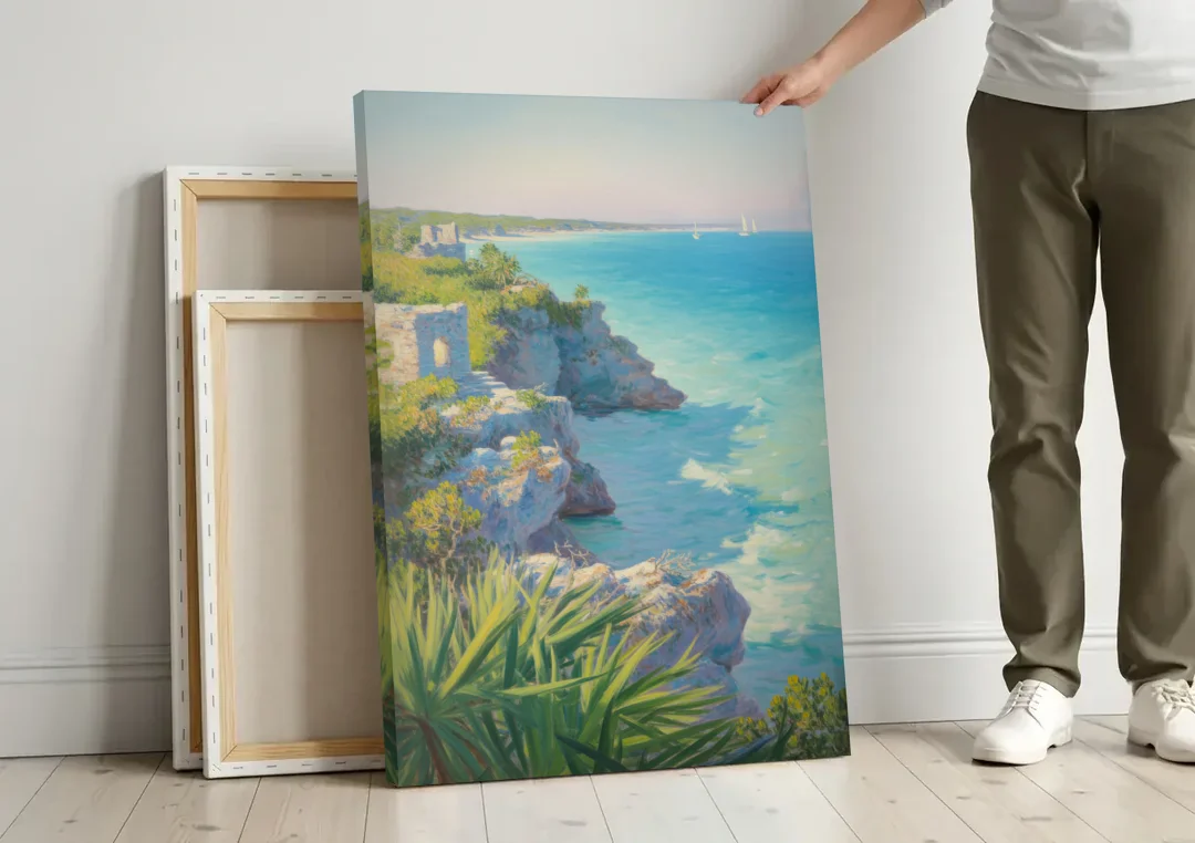 Tulum Cliff Ruins canvas wall art leaning against a wall next to blank canvases