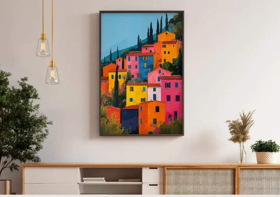 Tuscan Art of Colorful Hill Houses canvas wall art above a wooden sideboard under pendant lights