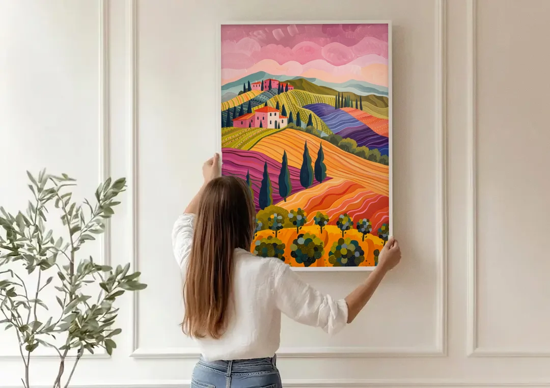 Tuscany Art of Rolling Hills in Pink canvas wall art being hung on a paneled wall