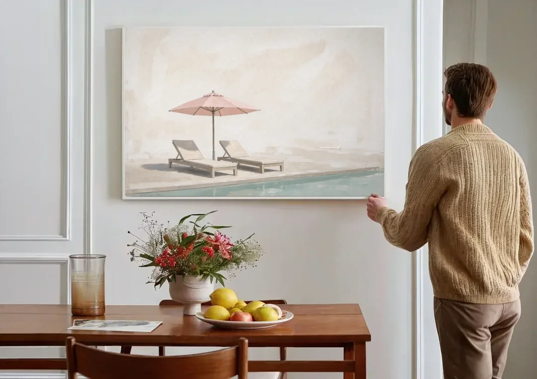 Two Chaise Longues Under a Pink Umbrella canvas wall art above a dining table